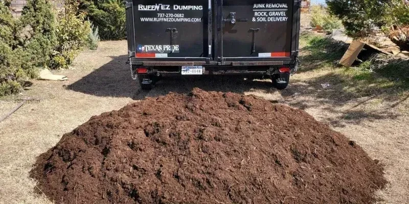 Ruff'N EZ trailer delivering materials in Central Texas